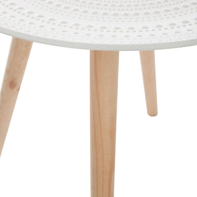 Stolik z okrągłym blatem, cztery pochylone nogi dodają meblowi modnego kształtu
